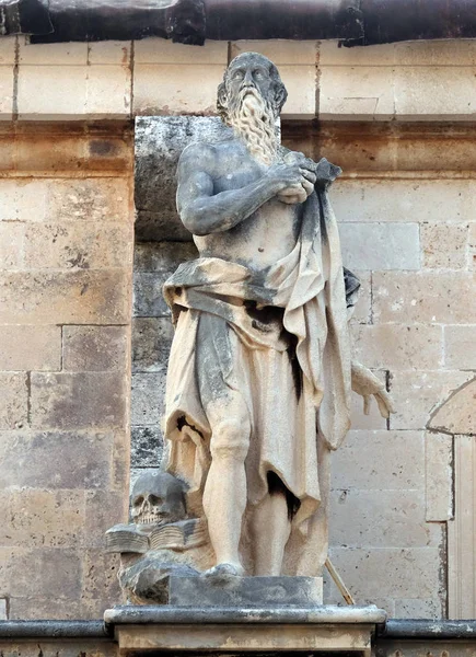 Statue of Saint Jerome on the Cathedral of Assumption of the Virgin Mary in the Old Town of Dubrovnik, Croatia.