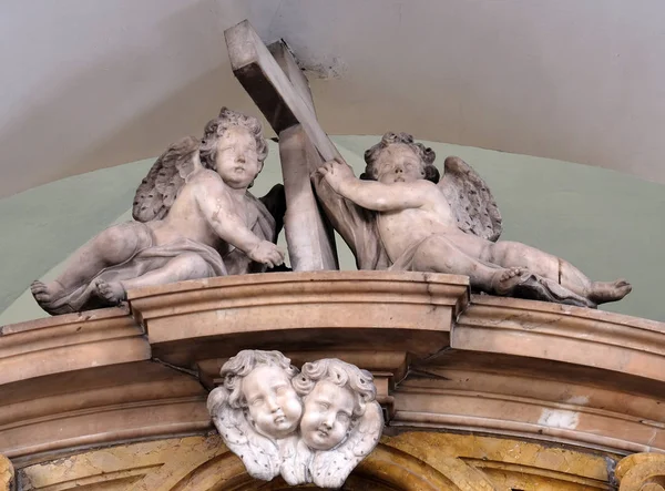 Angels on the altar in Franciscan church of the Friars Minor in Dubrovnik, Croatia.