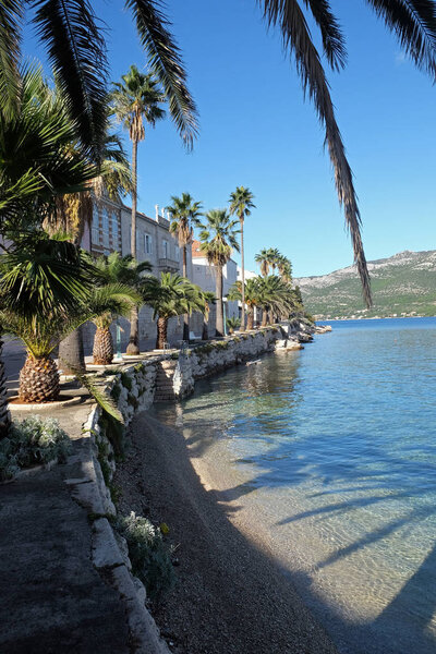 Seafront view at picturesque medieval Dalmatian town Korcula, Croatian culture and historic destination.