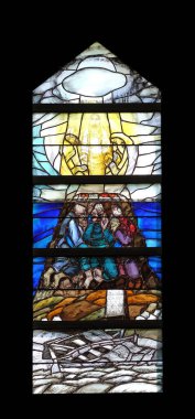 Tanrı, oğlu İsa aracılığıyla bu dünyada kurtuluşa kavuşuyor. Bu pencere, Almanya 'nın Piflas kentindeki St. John kilisesinde Sieger Koder tarafından boyalı.