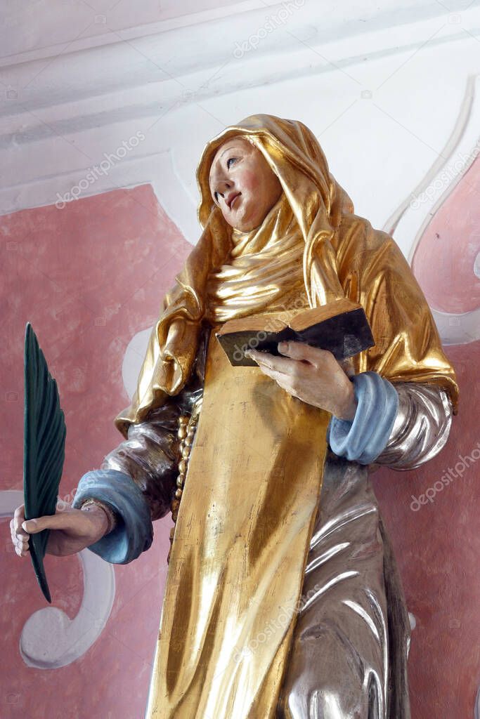 Saint Catherine of Siena, statue on the altar of Saint Apollonia in the Church of Saint Catherine of Alexandria in Zagreb, Croatia