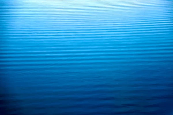 A tranquil water background. Abstraction for a relaxation — Stock Photo, Image