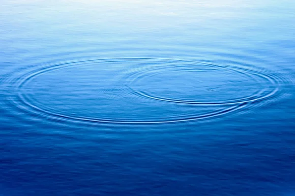 Water background. Ripples in water surface — Stock Photo, Image