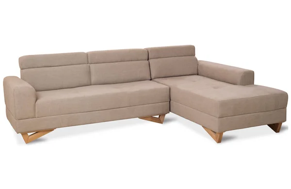 舒适的现代设计的角落沙发与米色颜色织品隔绝在白色背景上 免版税图库照片