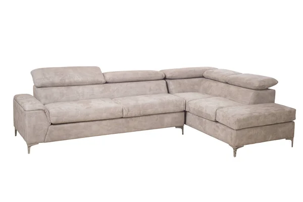 舒适的现代设计的角落沙发与米色颜色皮革隔绝在白色背景上 图库图片