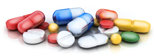 Wiele tabletek na białym tle — Zdjęcie stockowe