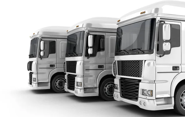 Drie witte grote vrachtwagen — Stockfoto