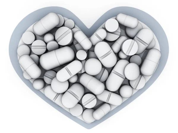Muitos comprimidos e vitamina no coração forma — Fotografia de Stock