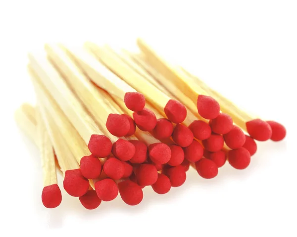 Stack of matchsticks on a white. Stock Photo