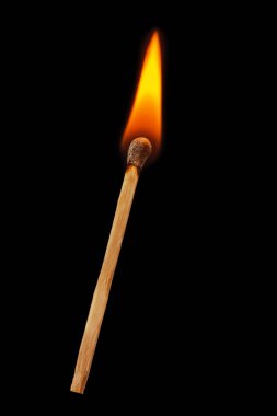 Matchstick on a black background. clipart