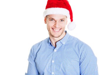 Beyaz adam için santa Noel şapka giyiyor. Beyaz arka plan üzerinde izole genç iş adamı. Başarılı çocuk Noel Baba şapkası