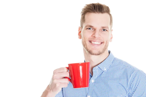 Knappe lachende zakenman houden rode Cup geïsoleerd op witte achtergrond — Stockfoto