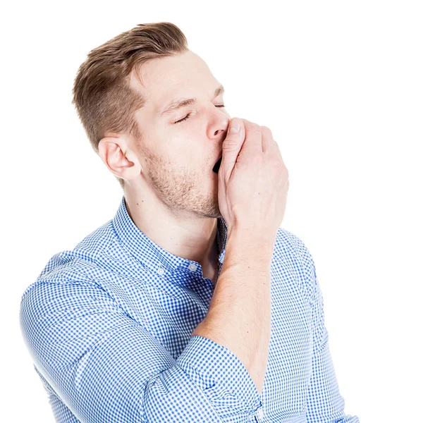 Hombre bostezando aislado sobre un fondo blanco — Foto de Stock