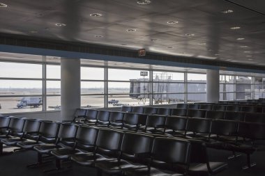 Havaalanı bekleme yeri bir arka plan üzerinde yatılı bir kol ile