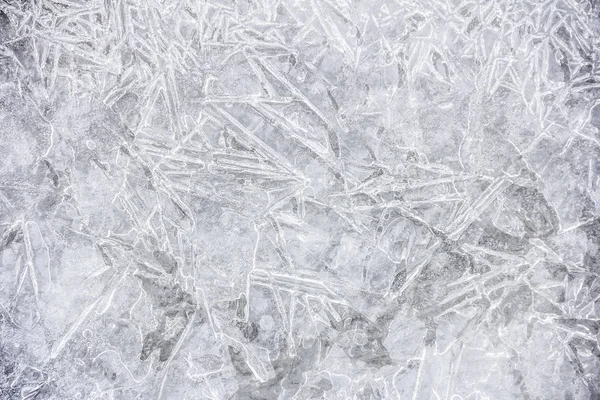 Eisbeschaffenheit auf einem Seewasser im Winter im Freien mit Schnee — Stockfoto