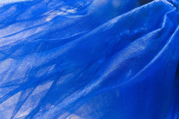 Tecido de organza de malha azul fundo de textura abstrata — Fotografia de Stock