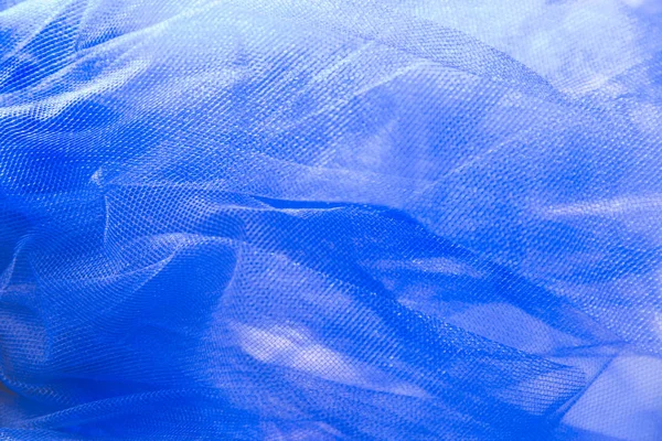 Blauwe mesh organza stof abstracte textuur achtergrond — Stockfoto