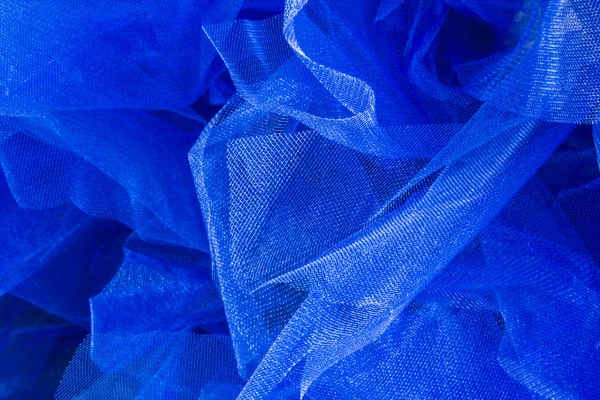 Blauwe mesh organza stof abstracte textuur achtergrond — Stockfoto