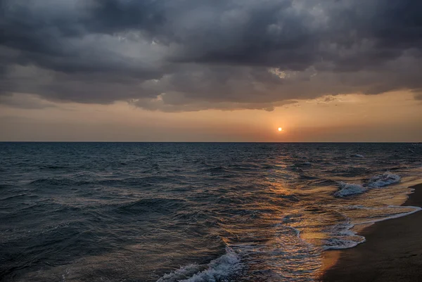 Закат на море Стоковая Картинка