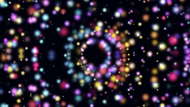 Πολλά Διαφορετικού Μεγέθους Πολύχρωμα Κινούμενα Σωματίδια Στο Χώρο Ένα Μαύρο — Αρχείο Βίντεο