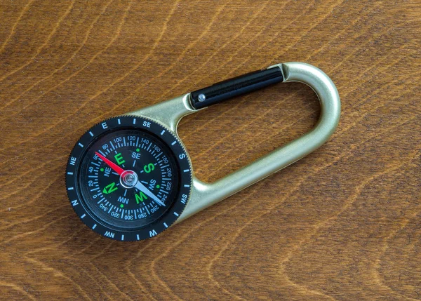 Compass and carabiner — Stock Photo, Image