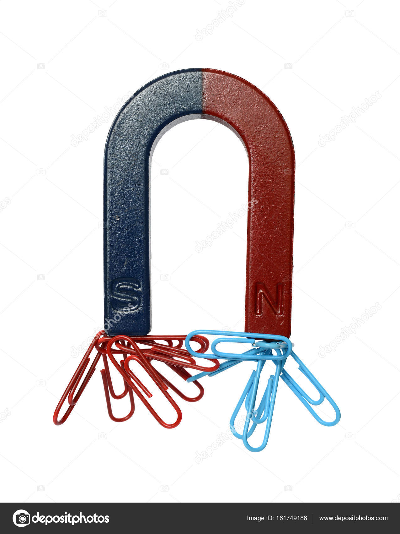 Magnet and paper clips Stock Photo by ©ivantcovlad 146981501