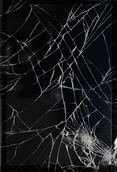 Cracked glass on black — Stock Photo, Image