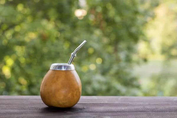 Yerba mate on green bokeh background. — Stock Photo, Image