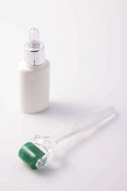 Derma roller for medical micro needling therapy.  clipart