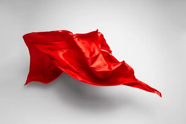 Abstract red fabric in motion — Stock Photo, Image