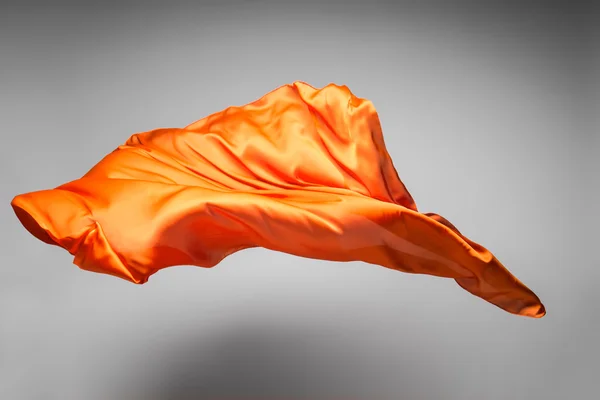Tecido voador laranja — Fotografia de Stock
