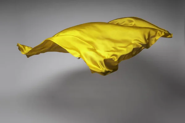 Tela voladora amarilla — Foto de Stock