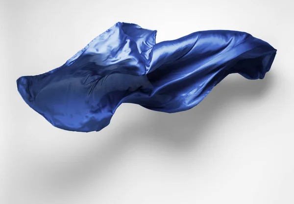 Abstract blue fabric in motion — Stock Photo, Image