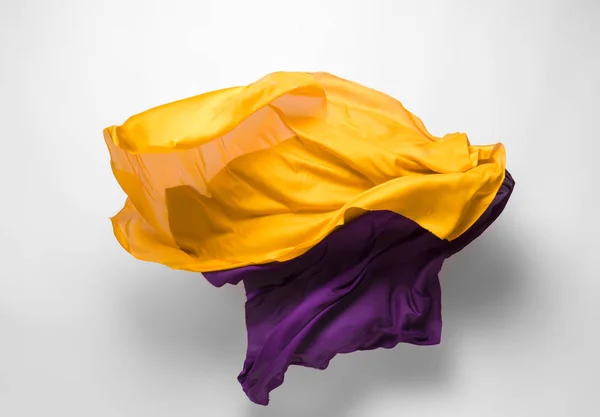 Abstracte gele stof in beweging — Stockfoto