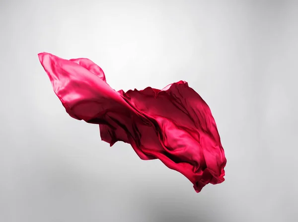 Абстрактна червона тканина в русі — стокове фото