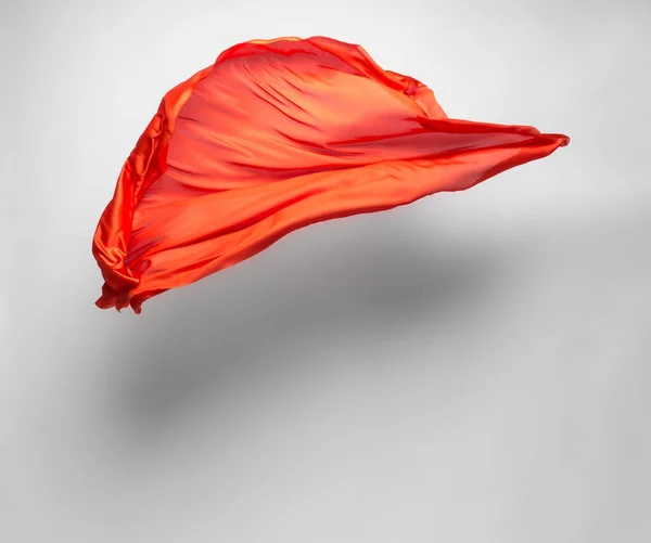 Abstraktní oranžové tkanině v pohybu — Stock fotografie