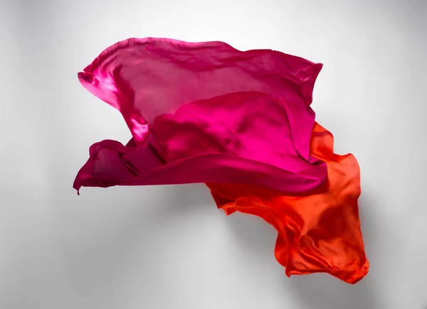 Abstract red fabric in motion Stock Photo