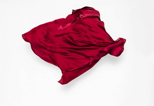 Tecido vermelho abstrato em movimento — Fotografia de Stock