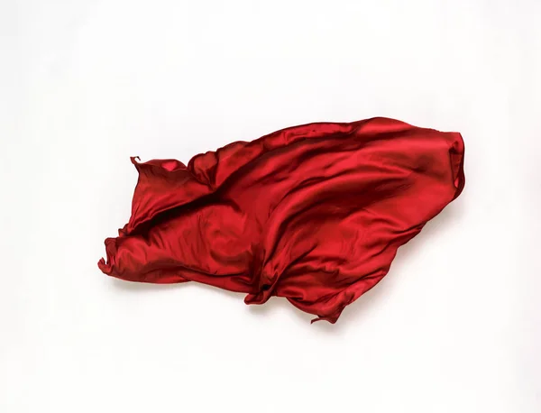 Tecido vermelho abstrato em movimento — Fotografia de Stock