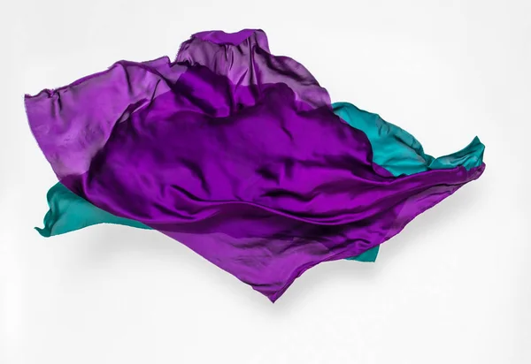 Абстрактна зелена і фіолетова тканина в русі — стокове фото