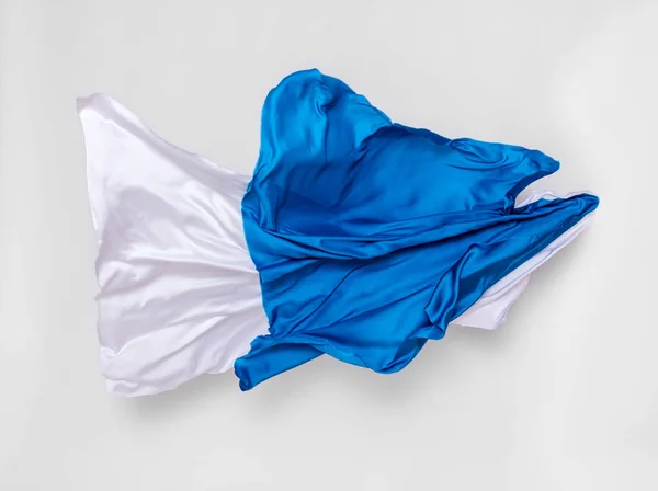 Abstraktní modré a bílé tkaniny v pohybu — Stock fotografie