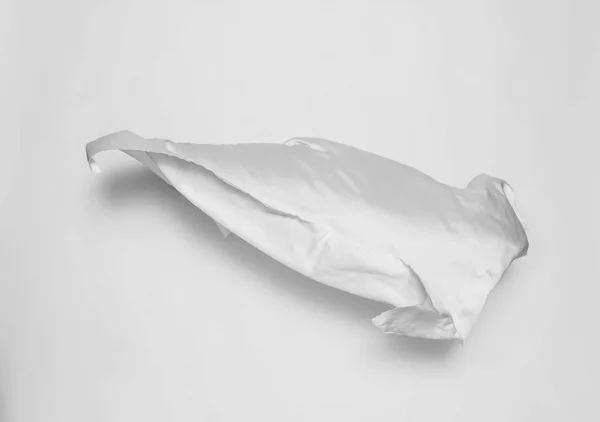 Beyaz arka plan üzerinde soyut beyaz kumaş — Stok fotoğraf