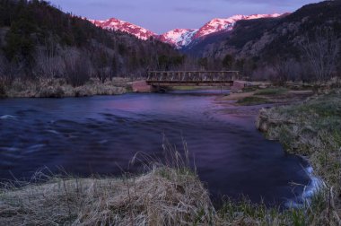 Sunrise in Rocky Mountain National Park and the Big Thompson Riv clipart
