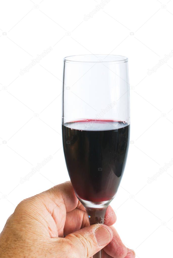 Hand with glass of red wine