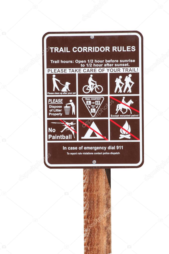 An informative sign with a list of rule for a hiking trail