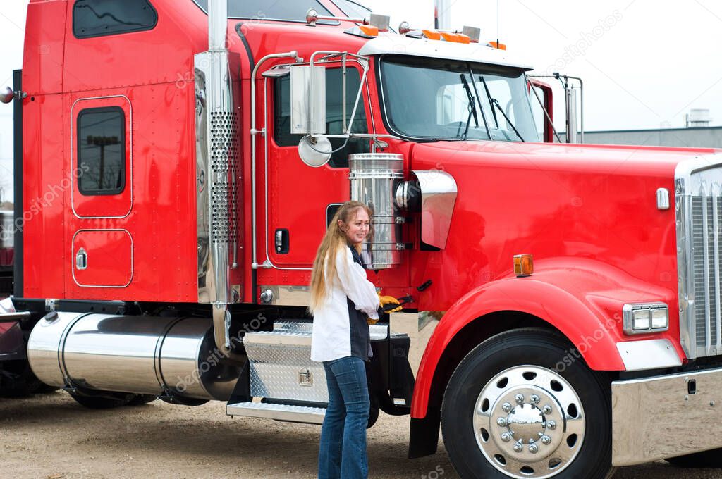 Woman Truck Driver ready to do a pre-trip inspection