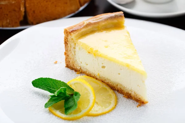 Lemon cheesecake on a plate — Stock Photo, Image