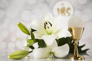 Holy communion and a golden chalice with flowers clipart