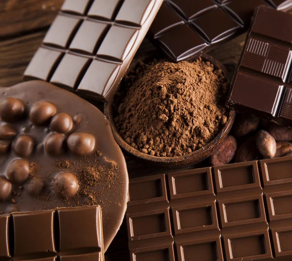 Chocolate bars with cocoa pod — Stock Photo, Image