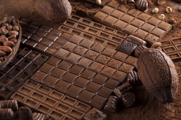Chocolate bars with cocoa pod — Stock Photo, Image